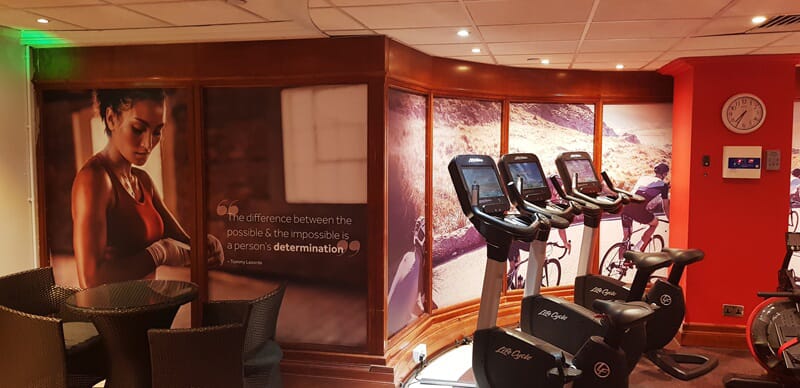 An image of interior signage inside a gym.